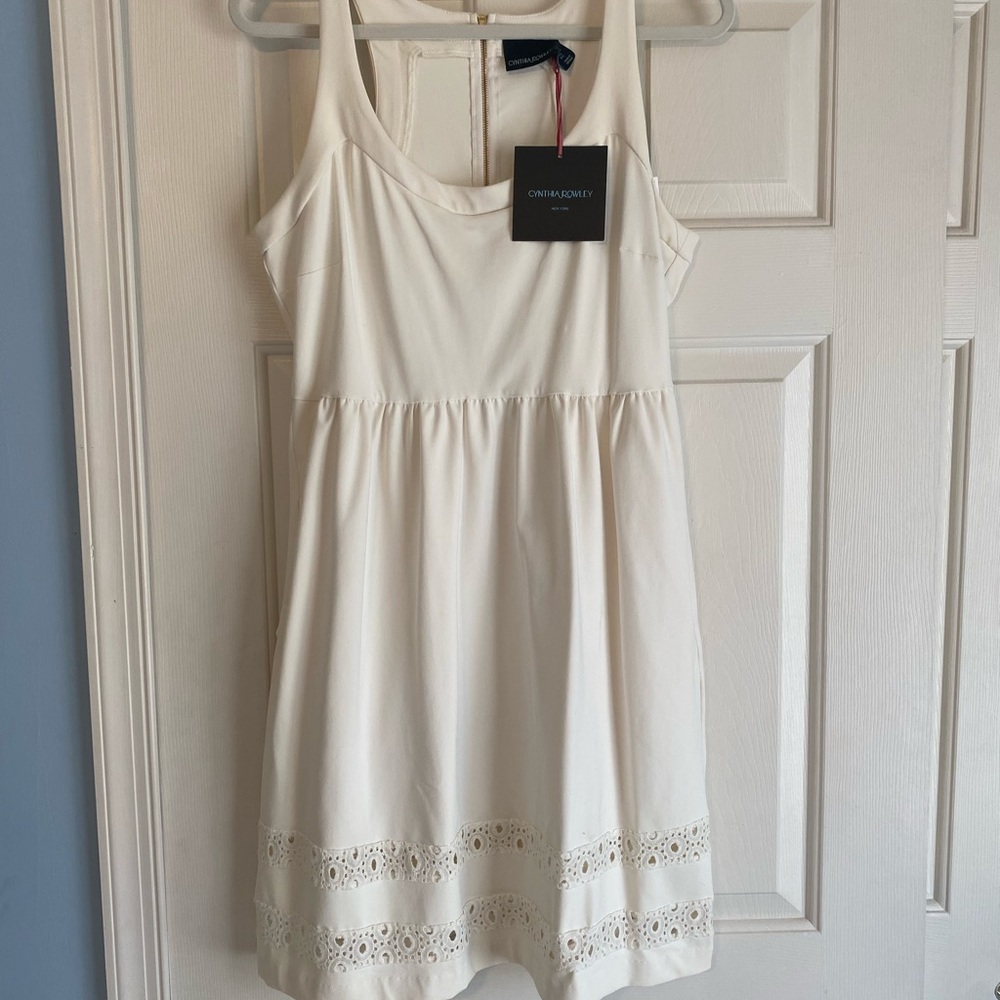 Cynthia Rowley ivory midi dress with eyelet accents. Size Large, stretch.